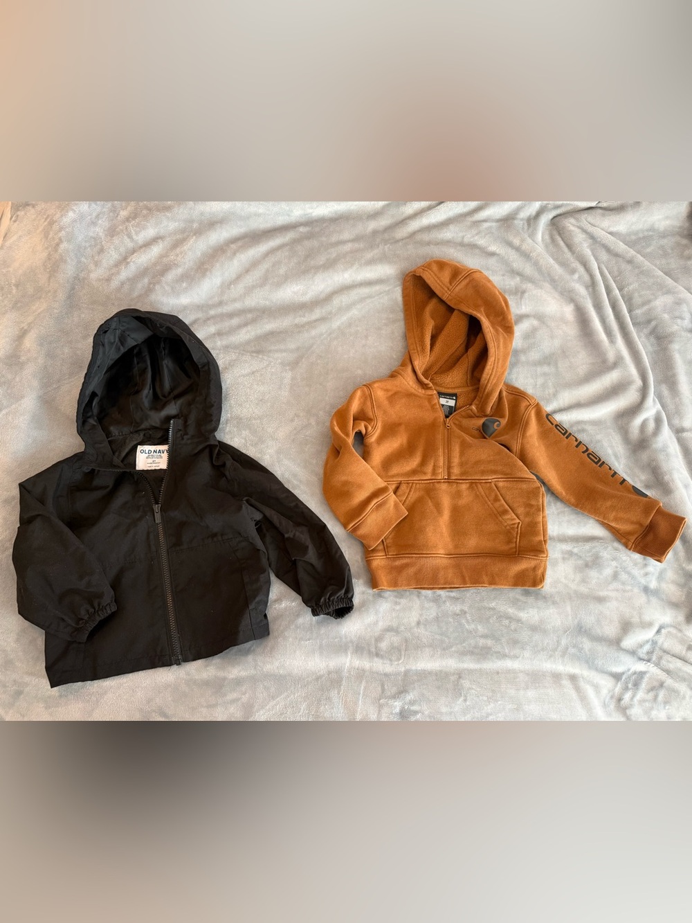 Carhartt Brown Hooded Quarter Zip Pullover Sweatshirt and Old Navy Rain Jacket